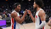 Dec 26, 2024; Sacramento, California, USA; Detroit Pistons guard Jaden Ivey (23) and guard Cade Cunningham (2) celebrate after the win against the Sacramento Kings at Golden 1 Center. Mandatory Credit: Kelley L Cox-Imagn Images