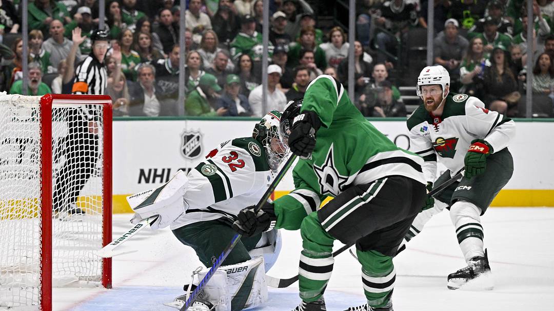 Apr 9, 2026; Dallas, Texas, USA; Dallas Stars center Cameron Hughes (34) scores his first career NHL goal during the second period against Minnesota Wild goaltender Filip Gustavsson (32) at the American Airlines Center. Mandatory Credit: Jerome Miron-Imagn Images
