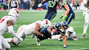 Nov 9, 2025; Seattle, Washington, USA;  Seattle Seahawks running back George Holani (36) rushes during the fourth quarter against the Arizona Cardinals at Lumen Field. Mandatory Credit: Steven Bisig-Imagn Images