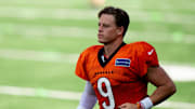 Cincinnati Bengals quarterback Joe Burrow (9) runs onto the field during Bengals Camp practice at Paycor Stadium in Cincinnati on Aug. 2, 2025.