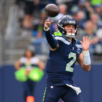 Aug 7, 2025; Seattle, Washington, USA; Seattle Seahawks quarterback Drew Lock (2) passes the ball against the Las Vegas Raiders during the first half at Lumen Field. Mandatory Credit: Steven Bisig-Imagn Images