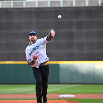 Former MLB pitcher James Paxton throws out the ceremonial first pitch before the game between the Seattle Mariners and the Toronto Blue Jays at T-Mobile Park on May 10.