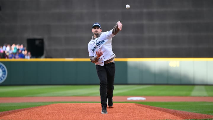 May 10, 2025; Seattle, Washington, USA; Former MLB pitcher James Paxton throws out the ceremonial first pitch before the game between the Seattle Mariners and the Toronto Blue Jays at T-Mobile Park. Mandatory Credit: Steven Bisig-Imagn Images