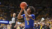 Nov 13, 2025; Morgantown, West Virginia, USA; Pittsburgh Panthers guard Brandin Cummings (3) shoots a three pointer during the first half against the West Virginia Mountaineers at WVU Coliseum. Mandatory Credit: Ben Queen-Imagn Images