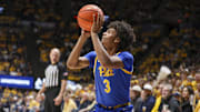Nov 13, 2025; Morgantown, West Virginia, USA; Pittsburgh Panthers guard Brandin Cummings (3) shoots a three pointer during the first half against the West Virginia Mountaineers at WVU Coliseum. Mandatory Credit: Ben Queen-Imagn Images