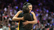 Sep 28, 2025; Phoenix, Arizona, USA; Phoenix Mercury guard Monique Akoa Makani (8) and forward Alyssa Thomas (25) celebrate after defeating the Minnesota Lynx during game four of the second round for the 2025 WNBA Playoffs at PHX Arena. Mandatory Credit: Rick Scuteri-Imagn Images
