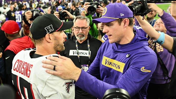 Falcons quarterback Kirk Cousins chats with Vikings coach Kevin O'Connell after a 2024 game at U.S. Bank Stadium. 