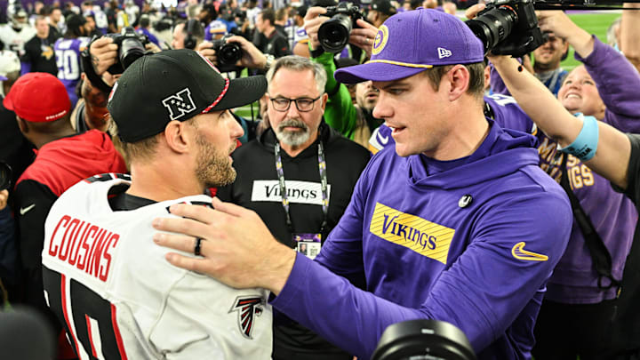 Dec 8, 2024; Minneapolis, Minnesota, USA; Atlanta Falcons quarterback Kirk Cousins (18) and Minnesota Vikings head coach Kevin O'Connell talk after the game at U.S. Bank Stadium.