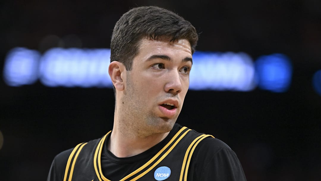 Mar 26, 2026; Houston, TX, USA; Iowa Hawkeyes forward Alvaro Folgueiras (7) looks on during the second half against the Nebraska Cornhuskers during a Sweet Sixteen game of the South Regional of the men's 2026 NCAA Tournament at Toyota Center. Mandatory Credit: Maria Lysaker-Imagn Images