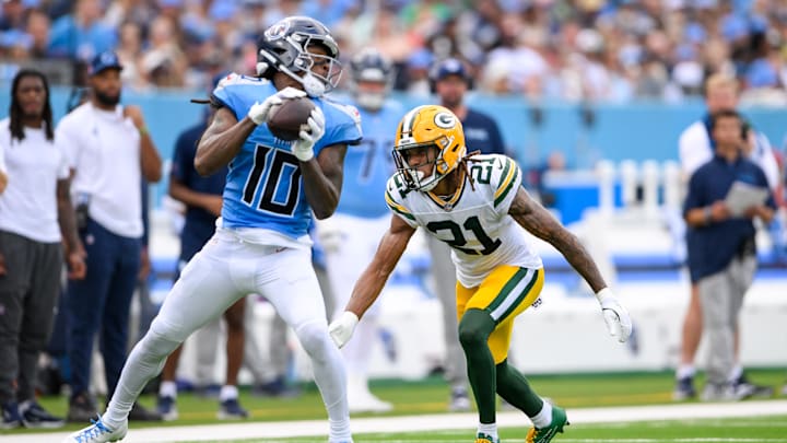Tennessee Titans wide receiver DeAndre Hopkins makes a catch as Green Bay Packers cornerback Eric Stokes covers during the first half of a September game at Nissan Stadium. Tennessee Titans wide receiver DeAndre Hopkins makes a catch as Green Bay Packers cornerback Eric Stokes covers during the first half of a September game at Nissan Stadium.
