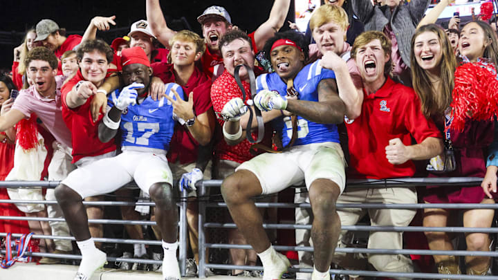 Nov 15, 2025; Oxford, Mississippi, USA; Mississippi Rebels wide receiver Winston Watkins (17) and running back Kewan Lacy (5) react with fans after defeating the Florida Gators at Vaught-Hemingway Stadium. Mandatory Credit: Petre Thomas-Imagn Images