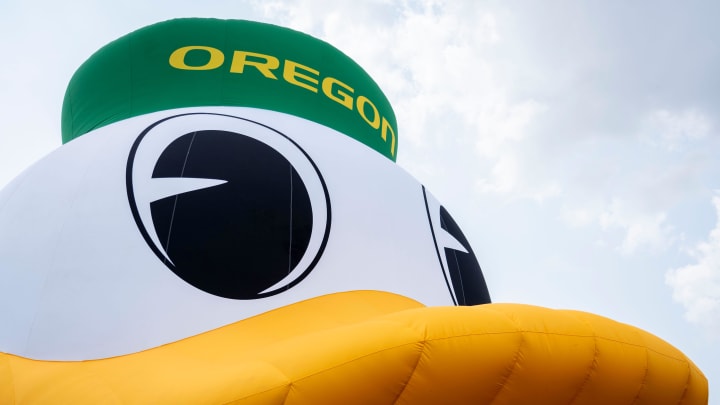 An inflatable of the University of Oregon Duck mascot floats on the White River in front of the NCAA Headquarters on Tuesday, July 23, 2024, in downtown Indianapolis. The float weighs in at 1,600 pounds and takes 1.5 hours to inflate.