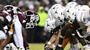 Nov 30, 2024; College Station, Texas, USA; A detail view of the line of scrimmage during the first half of the game between the Texas A&M Aggies and the Texas Longhorns. The Longhorns defeated the Aggies 17-7 at Kyle Field. Mandatory Credit: Maria Lysaker-Imagn Images 