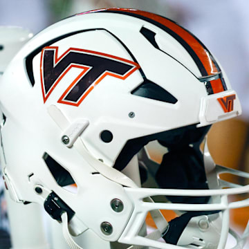 Sep 10, 2022; Blacksburg, Virginia, USA;  A Virginia Tech Hokies helmet sits near the team bench during the first quarter against the Boston College Eagles at Lane Stadium. Mandatory Credit: Reinhold Matay-Imagn Images