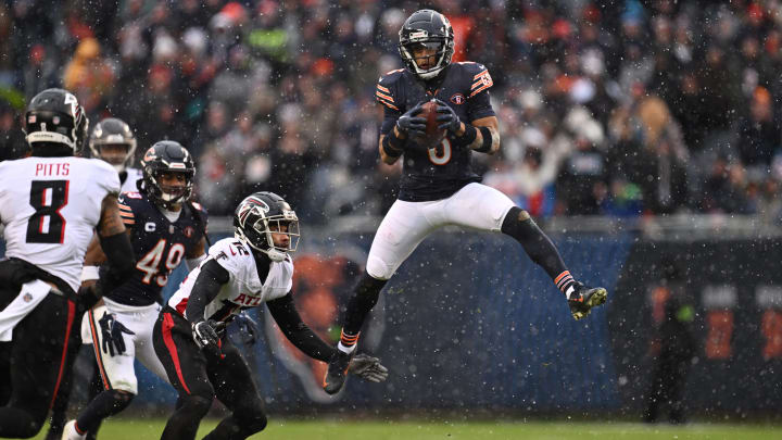 Kyler Gordon goes airborne for an interception against the Atlanta Falcons. The Bears secondary is earning little respect despite a strong second half last year.