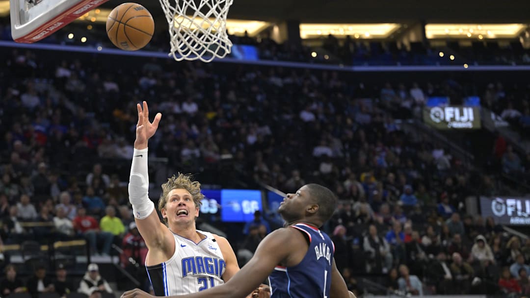 Nov 20, 2024; Inglewood, California, USA; Orlando Magic center Moritz Wagner (21) drives past Los Angeles Clippers center Mo Bamba (4) in the second half at Intuit Dome. Mandatory Credit: Jayne Kamin-Oncea-Imagn Images Nov 20, 2024; Inglewood, California, USA; Orlando Magic center Moritz Wagner (21) drives past Los Angeles Clippers center Mo Bamba (4) in the second half at Intuit Dome. Mandatory Credit: Jayne Kamin-Oncea-Imagn Images