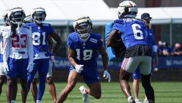Jul 26, 2024; East Rutherford, NJ, USA; New York Giants wide receiver Isaiah Hodgins (18) does a drill during training camp at Quest Diagnostics Training Center. Mandatory Credit: Lucas Boland-USA TODAY Sports