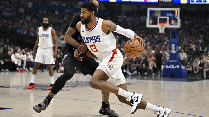 May 3, 2024; Dallas, Texas, USA; LA Clippers forward Paul George (13) drives to the basket against the Dallas Mavericks during the first quarter during game six of the first round for the 2024 NBA playoffs at American Airlines Center.