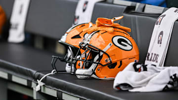 Dec 29, 2024; Minneapolis, Minnesota, USA;  A Green Bay Packers helmet sits ready before the game against the Minnesota Vikings at U.S. Bank Stadium. Mandatory Credit: Jeffrey Becker-Imagn Images