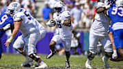 Sep 20, 2025; Fort Worth, Texas, USA; TCU Horned Frogs running back Trent Battle (6) runs with the ball against the SMU Mustangs during the second half at Amon G. Carter Stadium. Mandatory Credit: Jerome Miron-Imagn Images