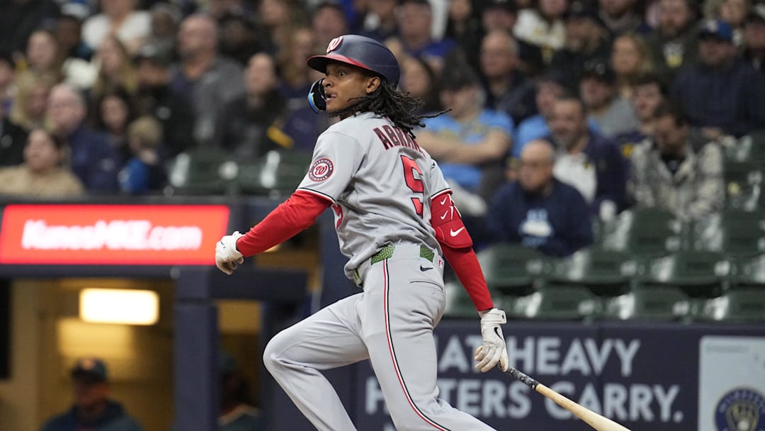 Apr 11, 2026; Milwaukee, Wisconsin, USA; Washington Nationals shortstop CJ Abrams (5) gets a hit against the Milwaukee Brewers in the fourth inning at American Family Field. Mandatory Credit: Michael McLoone-Imagn Images