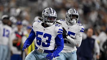 Aug 16, 2025; Arlington, Texas, USA; Dallas Cowboys linebacker James Houston (53) and cornerback Andrew Booth (25) return an interception for a touchdown during the game between the Dallas Cowboys and the Baltimore Ravens at AT&T Stadium. Mandatory Credit: Jerome Miron-Imagn Images