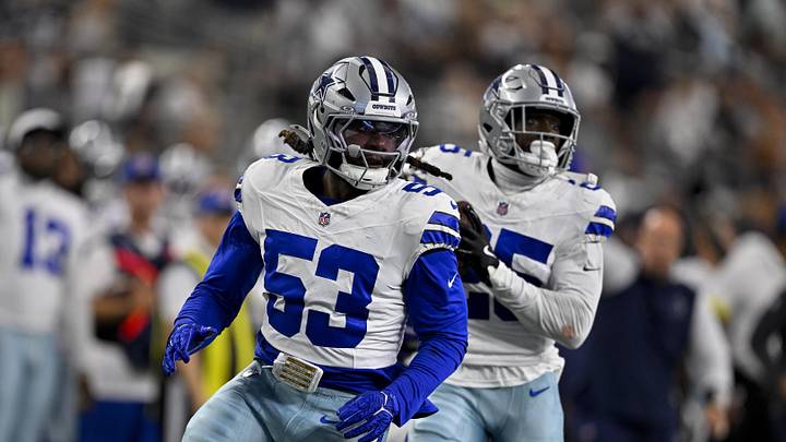 Aug 16, 2025; Arlington, Texas, USA; Dallas Cowboys linebacker James Houston (53) and cornerback Andrew Booth (25) return an interception for a touchdown during the game between the Dallas Cowboys and the Baltimore Ravens at AT&T Stadium. Mandatory Credit: Jerome Miron-Imagn Images