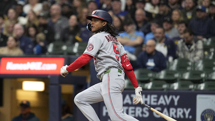 Apr 11, 2026; Milwaukee, Wisconsin, USA; Washington Nationals shortstop CJ Abrams (5) gets a hit against the Milwaukee Brewers in the fourth inning at American Family Field. Mandatory Credit: Michael McLoone-Imagn Images