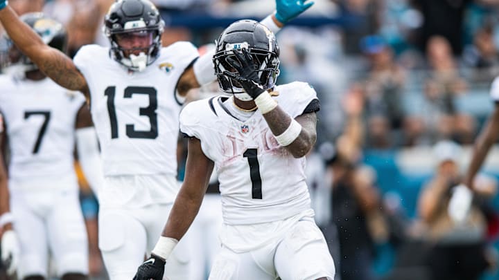 Sep 15, 2024; Jacksonville, Florida, USA; Jacksonville Jaguars running back Travis Etienne Jr (1) celebrates his touchdown against the Cleveland Browns in the third quarter at EverBank Stadium. Mandatory Credit: Jeremy Reper-Imagn Images