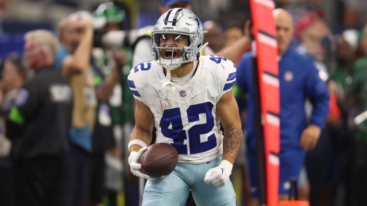 Sep 17, 2023; Arlington, Texas, USA; Dallas Cowboys running back Deuce Vaughn (42) reacts after making a first down in the second quarter against the New York Jets at AT&T Stadium. Mandatory Credit: Tim Heitman-USA TODAY Sports