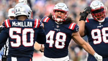 Nov 6, 2022; Foxborough, Massachusetts, USA; New England Patriots linebacker Jahlani Tavai (48) reacts with linebacker Raekwon McMillan (50) after sacking Indianapolis Colts quarterback Sam Ehlinger (not seen) during the second half at Gillette Stadium. Mandatory Credit: Brian Fluharty-USA TODAY Sports