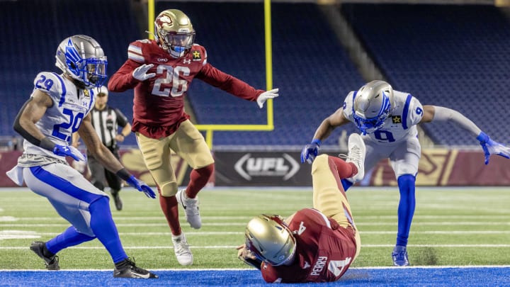 Mar 30, 2024; Detroit, MI, USA; Michigan Panthers quarterback E.J. Perry (4) scores a touchdown against the St. Louis Battlehawks during the second half at Ford Field. Mandatory Credit: David Reginek-USA TODAY Sports