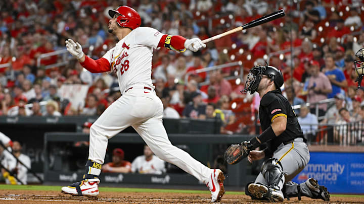 St. Louis Cardinals third baseman Nolan Arenado hits a single against the Pittsburgh Pirates during the third inning of a September 18 game at Busch Stadium. St. Louis Cardinals third baseman Nolan Arenado hits a single against the Pittsburgh Pirates during the third inning of a September 18 game at Busch Stadium.
