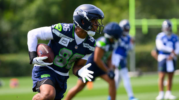 Seattle Seahawks tight end Pharaoh Brown (86) carries the ball after making a catch during training camp.