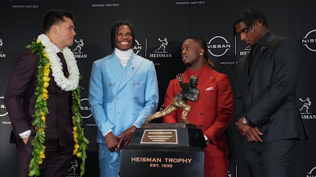 New York, NY, USA; From left, Heisman Trophy nominees Oregon Ducks quarterback Dillon Gabriel, Colorado Buffaloes wide receiv