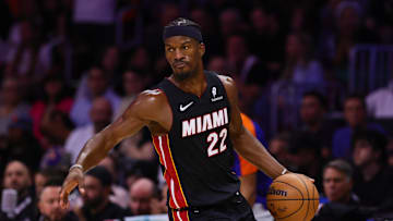 Oct 30, 2024; Miami, Florida, USA; Miami Heat forward Jimmy Butler (22) dribbles the basketball against the New York Knicks during the second quarter at Kaseya Center. Mandatory Credit: Sam Navarro-Imagn Images