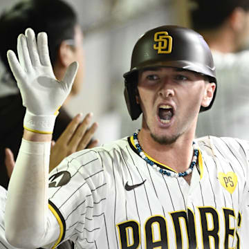 Sep 4, 2024; San Diego, California, USA; San Diego Padres center fielder Jackson Merrill (3) is congratulated after hitting a three-run home run during the fourth inning against the Detroit Tigers at Petco Park. Mandatory Credit: Denis Poroy-Imagn Images