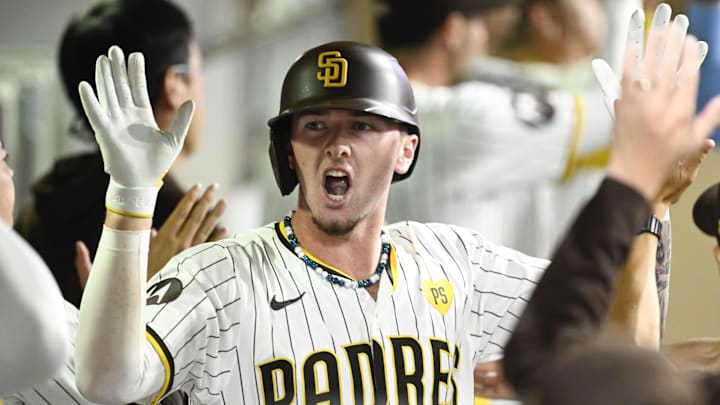 Sep 4, 2024; San Diego, California, USA; San Diego Padres center fielder Jackson Merrill (3) is congratulated after hitting a three-run home run during the fourth inning against the Detroit Tigers at Petco Park. Mandatory Credit: Denis Poroy-Imagn Images