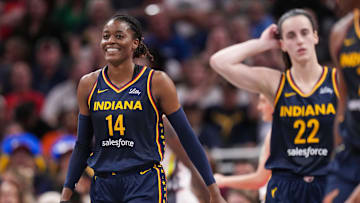 Indiana Fever center Temi Fagbenle (14) smiles after a foul called on her on Sunday, Sept. 15, 2024, during the game at Gainbridge Fieldhouse in Indianapolis. The Indiana Fever defeated the Dallas Wings, 110-109.