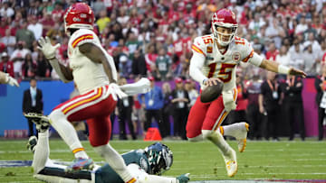 Kansas City Chiefs quarterback Patrick Mahomes (15) escapes a tackle attempt by Philadelphia Eagles linebacker Haason Reddick (7) during the first quarter in Super Bowl LVII at State Farm Stadium in Glendale on Feb. 12, 2023.

Nfl Super Bowl Lvii Kansas City Chiefs Vs Philadelphia Eagles