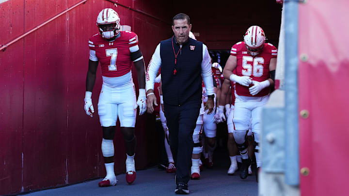 Oct 11, 2025; Madison, Wisconsin, USA; Wisconsin Badgers head coach Luke Fickell leads his team out of the tunnel at Camp Randall Stadium. Mandatory Credit: Ross Harried-Imagn Images