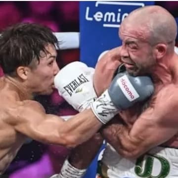 Four division champion Naoya Inoue (left) throws punches at his opponent TJ Doheny (right) in Ariake Arena, Tokyo