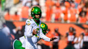 Sep 14, 2024; Corvallis, Oregon, USA; Oregon Ducks quarterback Dante Moore (5) calls a play during the second half against the Oregon State Beavers at Reser Stadium. Mandatory Credit: Craig Strobeck-Imagn Images