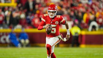 Dec 8, 2024; Kansas City, Missouri, USA; Kansas City Chiefs quarterback Patrick Mahomes (15) runs the ball during the second half against the Los Angeles Chargers at GEHA Field at Arrowhead Stadium. Mandatory Credit: Jay Biggerstaff-Imagn Images