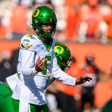 Sep 14, 2024; Corvallis, Oregon, USA; Oregon Ducks quarterback Dante Moore (5) calls a play during the second half against the Oregon State Beavers at Reser Stadium. 