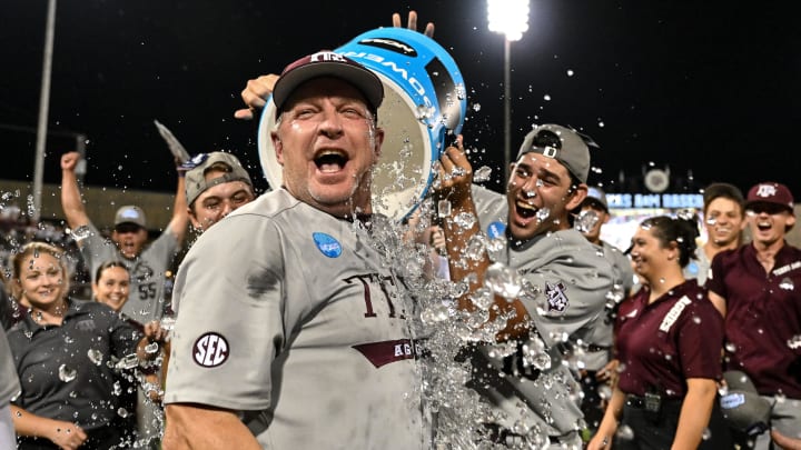 Jun 9, 2024; College Station, TX, USA; Texas A&M head coach Jim Schlossnagle celebrates after sweeping Oregon in the Bryan-College Station Super Regional series at Olsen Field, Blue Bell Park.