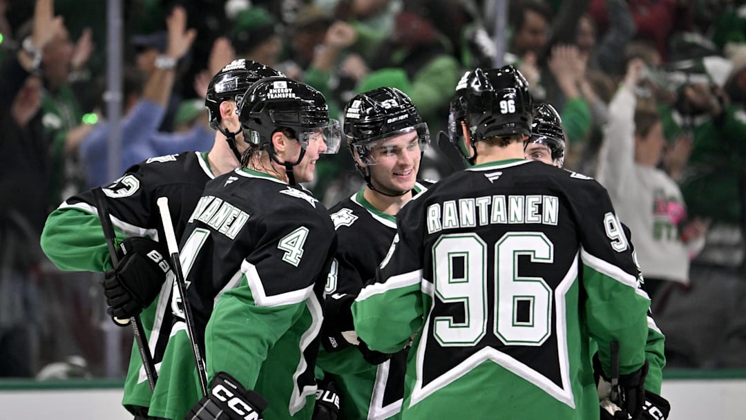 Apr 20, 2026; Dallas, Texas, USA; Dallas Stars center Wyatt Johnston (53) and defenseman Miro Heiskanen (4) and right wing Mikko Rantanen (96) celebrates Johnston scoring a goal during the game between the Stars and the Wild in game two of the first round of the 2026 Stanley Cup Playoffs at American Airlines Center. Mandatory Credit: Jerome Miron-Imagn Images
