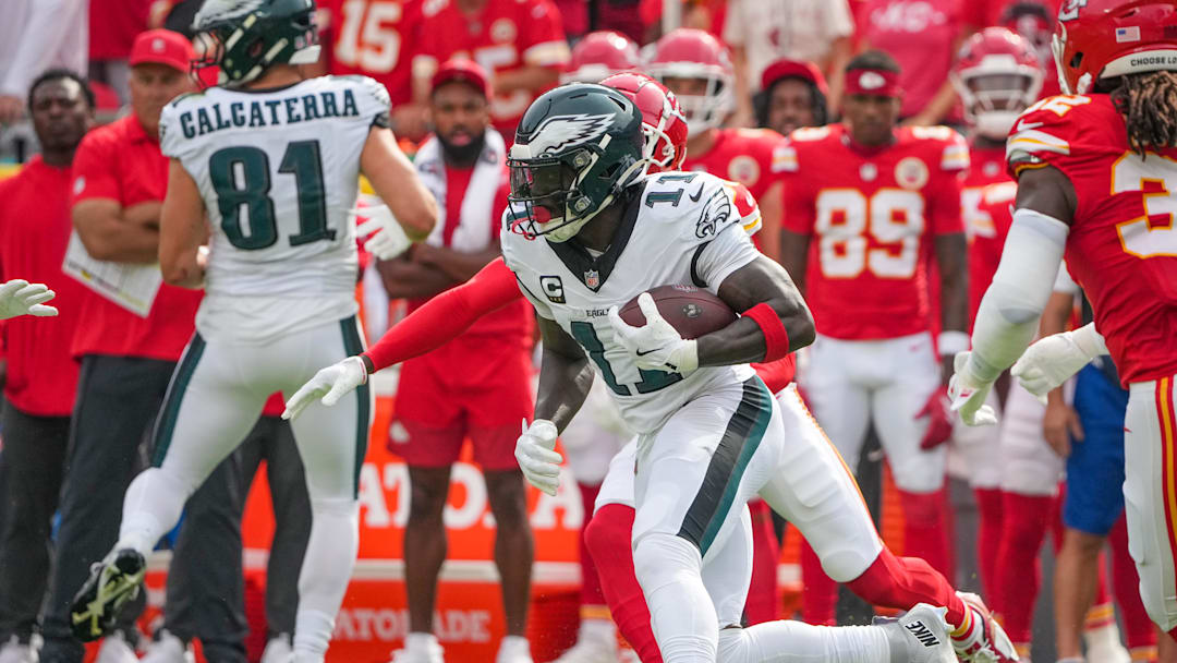 Sep 14, 2025; Kansas City, Missouri, USA; Philadelphia Eagles wide receiver A.J. Brown (11) runs the ball against the Kansas City Chiefs during the game at GEHA Field at Arrowhead Stadium. Mandatory Credit: Denny Medley-Imagn Images