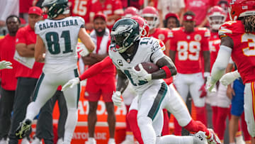 Sep 14, 2025; Kansas City, Missouri, USA; Philadelphia Eagles wide receiver A.J. Brown (11) runs the ball against the Kansas City Chiefs during the game at GEHA Field at Arrowhead Stadium. Mandatory Credit: Denny Medley-Imagn Images