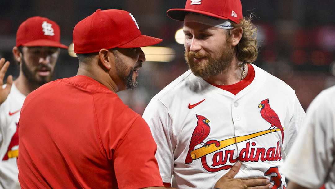 Aug 11, 2025; St. Louis, Missouri, USA;  St. Louis Cardinals second baseman Brendan Donovan (33) celebrates with manager Oliver Marmol (37) after the Cardinals defeated the Colorado Rockies at Busch Stadium. Mandatory Credit: Jeff Curry-Imagn Images